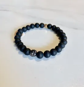 Matte Black Stretch Bracelet with 1 Gold Accent Bead and 1 Crystal Pave Bead
